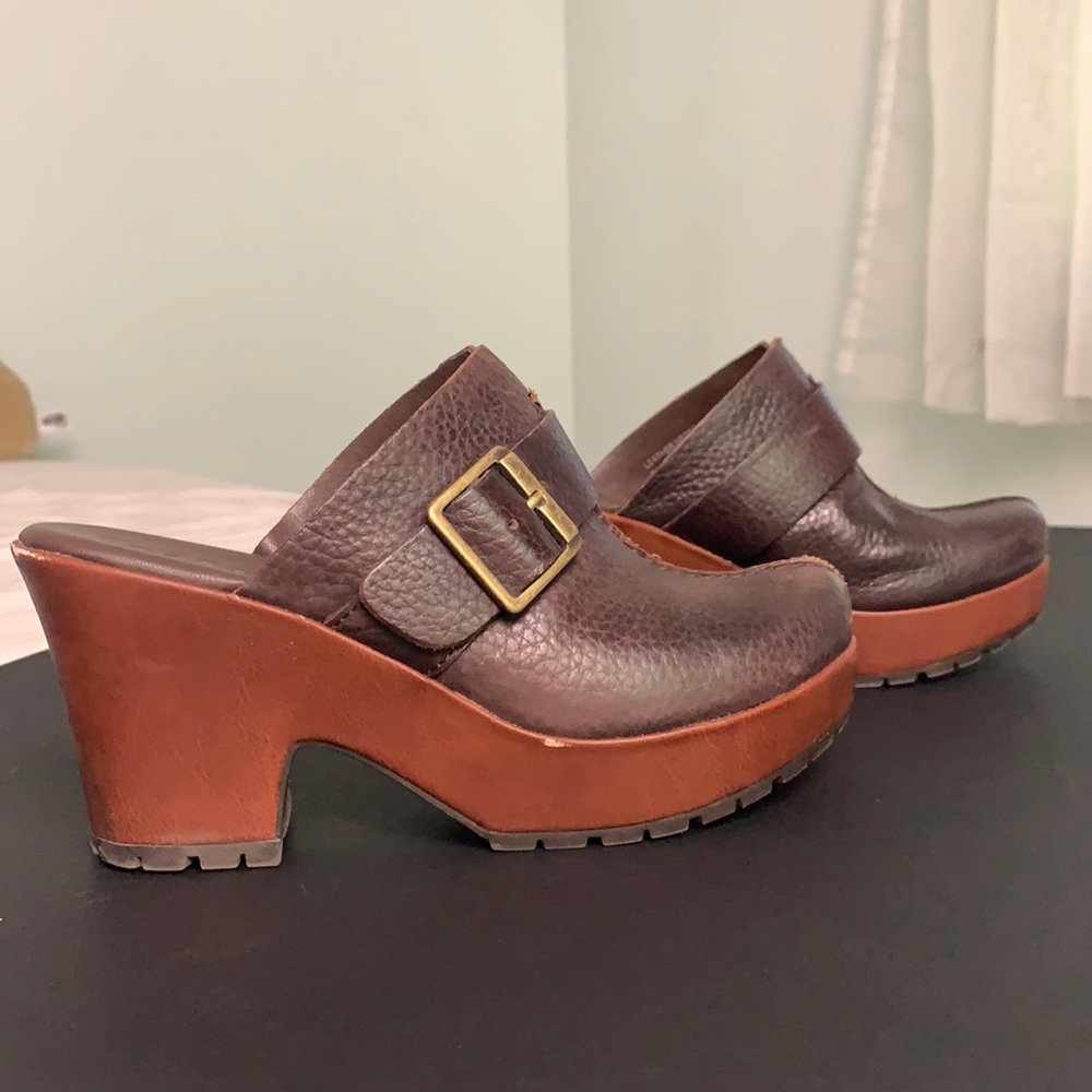 Kork Ease brown clogs with buckle detail. Platform